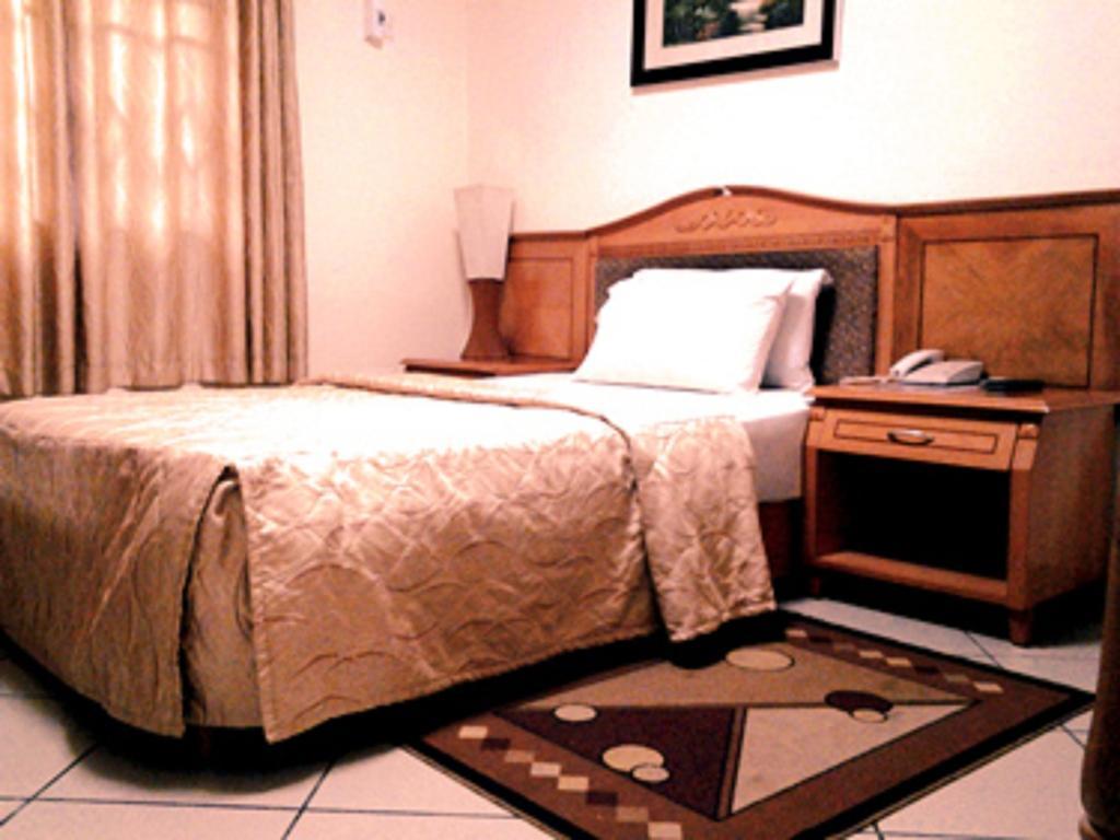 Sunset Hotel Kumasi Kamer foto